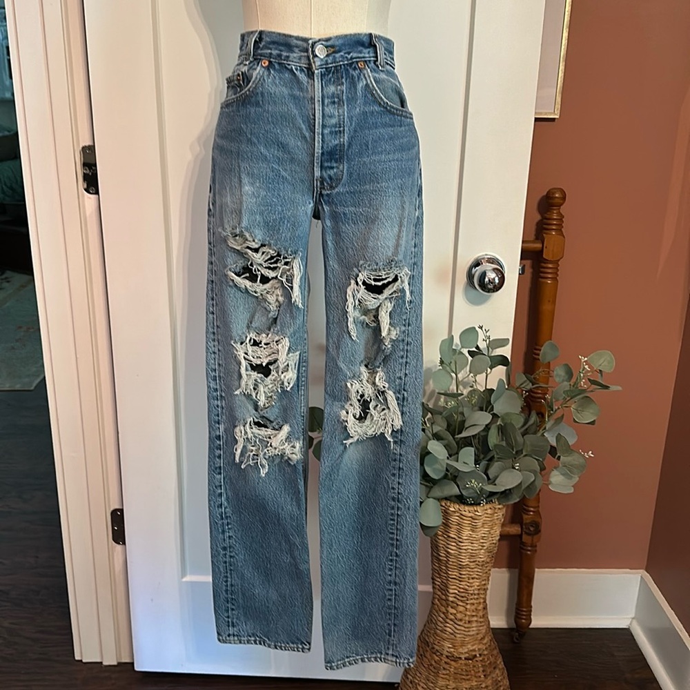 Vintage Levi’s 511 slim fit women’s distressed straight button fly 4x31 jeans